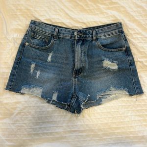 Distressed denim shorts